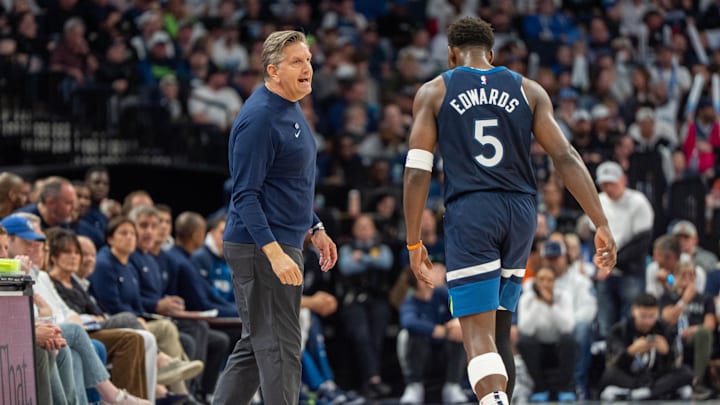 Minnesota Timberwolves head coach Chris Finch tries to calm guard Anthony Edwards. Minnesota Timberwolves head coach Chris Finch tries to calm guard Anthony Edwards.
