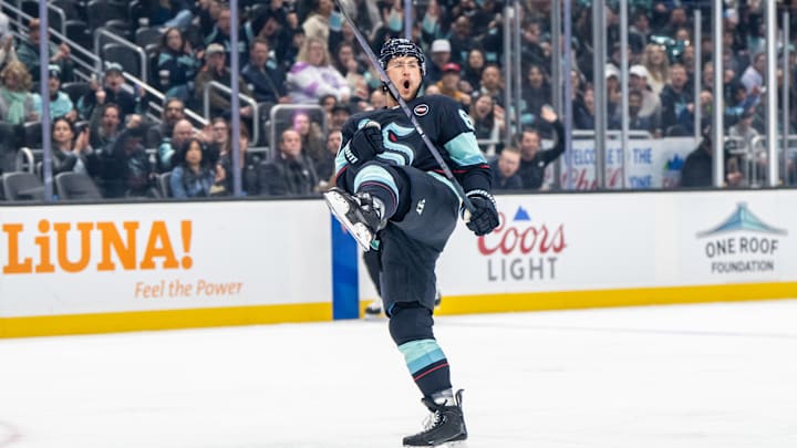 Mar 12, 2025; Seattle, Washington, USA;  Seattle Kraken defenseman Brandon Montour (62) celebrates scoring a goal against the Montreal Canadiens during the first periodat Climate Pledge Arena. Mandatory Credit: Stephen Brashear-Imagn Images