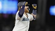Sep 18, 2024; Seattle, Washington, USA; Seattle Mariners first baseman Justin Turner celebrates his solo home run against the New York Yankees during the eighth inning at T-Mobile Park. Mandatory Credit: John Froschauer-Imagn Images