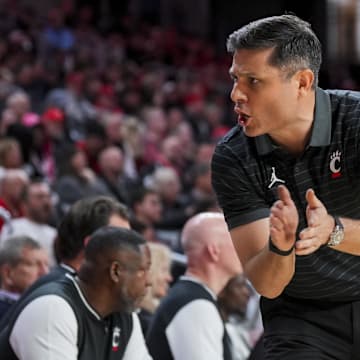Nov 3, 2025; Cincinnati, Ohio, USA;  Cincinnati Bearcats head coach Wes Miller works the sideline against the Western Carolina Catamounts in the second half at Fifth Third Arena. Mandatory Credit: Aaron Doster-Imagn Images