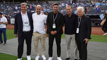 Jul 27, 2024; New York, NY, USA; From left, Ferran Soriano, Manchester City head coach Pep Guardiola, AC Milan head coach Paulo Fonseca, AC Milan owner Gerry Cardinale and Marty Edelman take a photo before the match between AC Milan and Manchester City at Yankee Stadium. Mandatory Credit: Lucas Boland-Imagn Images