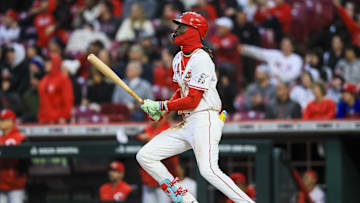 Mar 31, 2025; Cincinnati, Ohio, USA; Cincinnati Reds shortstop Elly De La Cruz (44) hits a three-run home run in the second inning against the Texas Rangers at Great American Ball Park. Mandatory Credit: Katie Stratman-Imagn Images