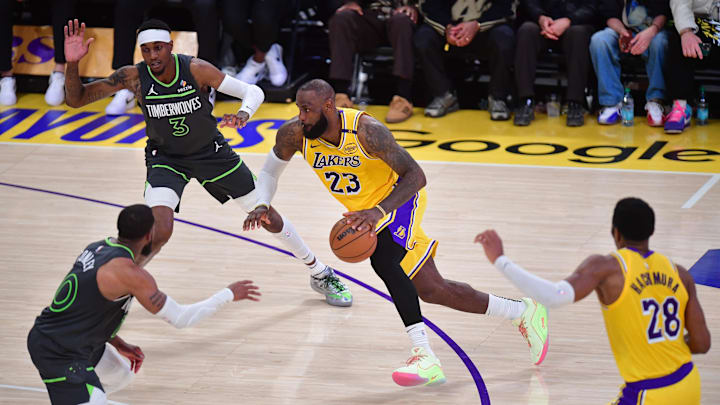 Los Angeles Lakers forward LeBron James against Minnesota Timberwolves forward Jaden McDaniels in the 2025 NBA Playoffs