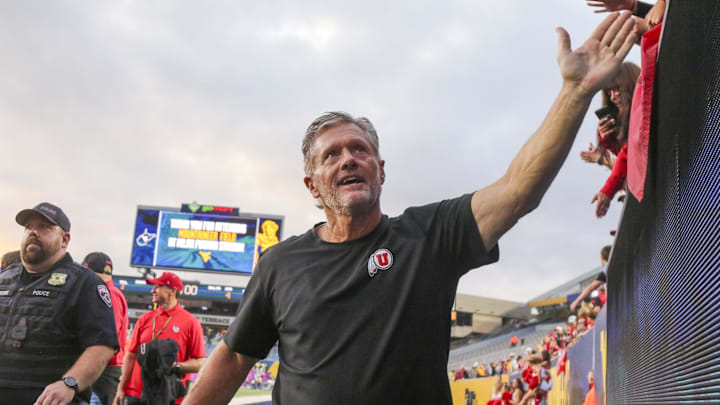 Former Utah head coach Kyle Whittingham has emerged as the frontrunner in Michigan's head coaching search.