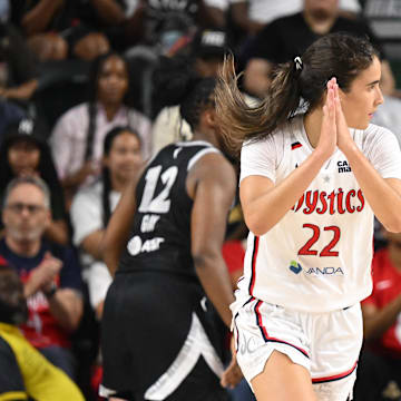 Jul 10, 2025; Washington, District of Columbia, USA; Washington Mystics guard Sonia Citron (22) reacts after scoring a basket against the Las Vegas Aces during the fourth quarter at EagleBank Arena. Mandatory Credit: Rafael Suanes-Imagn Images