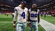Nov 3, 2024; Atlanta, Georgia, USA; Dallas Cowboys quarterback Dak Prescott (4) and wide receiver CeeDee Lamb (88) walk off the field after a loss against the Atlanta Falcons at Mercedes-Benz Stadium. Mandatory Credit: Brett Davis-Imagn Images