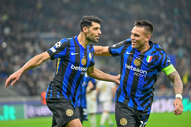 Mehdi Taremi and Lautaro Martinez