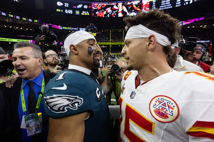 Philadelphia Eagles quarterback Jalen Hurts greets Kansas City Chiefs quarterback Patrick Mahomes following Super Bowl LIX