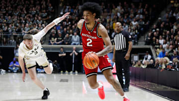 Rutgers Scarlet Knights guard Dylan Harper (2) drives past Purdue Boilermakers guard Braden Smith (3) Tuesday, March 4, 2025, during the NCAA men’s basketball game at Mackey Arena in West Lafayette, Ind.