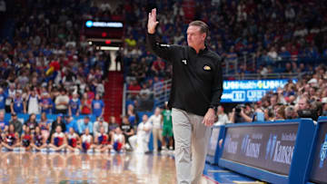 Kansas Jayhawks head coach Bill Self gives a signal to players during the second half of the game against Texas A&M-Corpus Christi Islanders inside Allen Fieldhouse on Nov. 11, 2025.