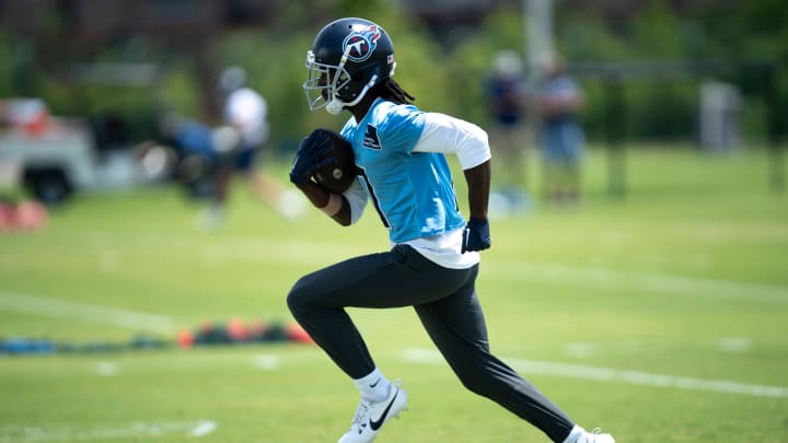 Wide receiver Calvin Ridley (0) runs after a catch during Tennessee Titans practice at Ascension Saint Thomas Sports Park in Nashville, Tenn., Wednesday, May 29, 2024.
