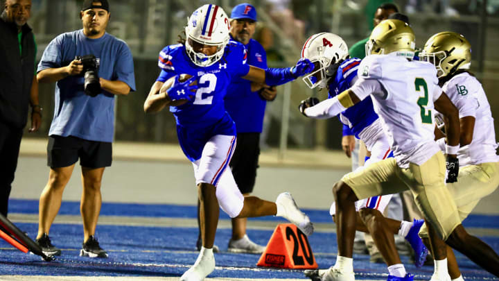 Folsom's Jameson Powell had five catches for 55 yards and a touchdown in his team's 63-20 win over Long Beach Poly Aug. 23 2024. Powell is a four-star junior receiver with 16 college offers. 