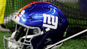 Oct 5, 2025; New Orleans, Louisiana, USA; A detail view of a New York Giants helmet on the sideline during the first half at Caesars Superdome. Mandatory Credit: Stephen Lew-Imagn Images