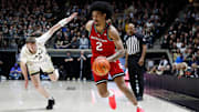 Rutgers Scarlet Knights guard Dylan Harper (2) drives past Purdue Boilermakers guard Braden Smith (3) Tuesday, March 4, 2025, during the NCAA men’s basketball game at Mackey Arena in West Lafayette, Ind.