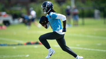 Wide receiver Calvin Ridley (0) runs after a catch during Tennessee Titans practice at Ascension Saint Thomas Sports Park in Nashville, Tenn.