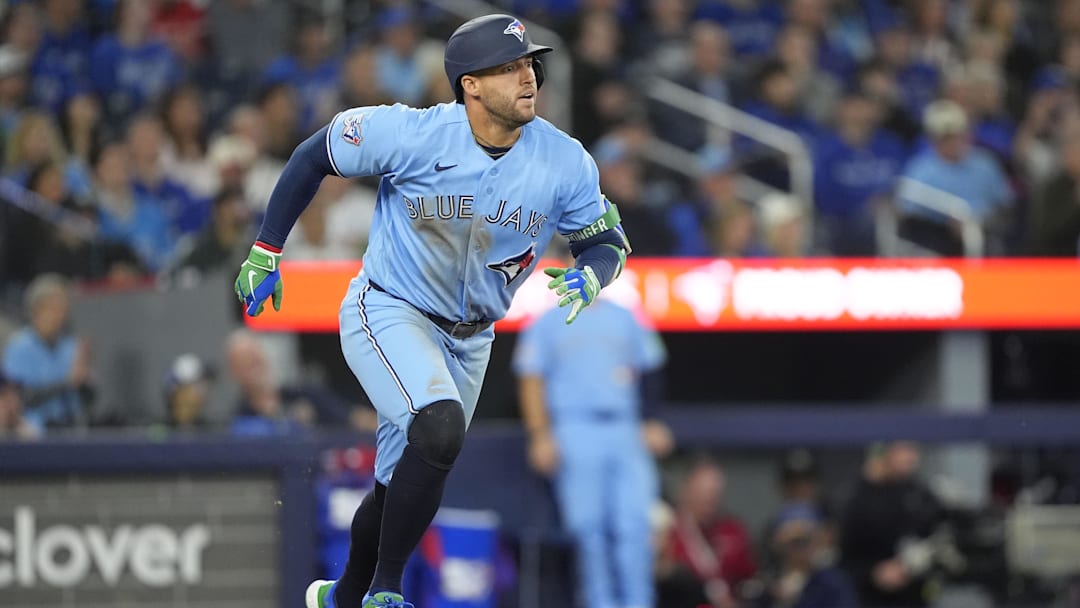 Toronto Blue Jays designated hitter George Springer hits a one run double.