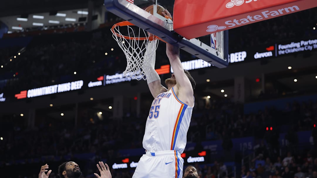 Dec 28, 2025; Oklahoma City, Oklahoma, USA; Oklahoma City Thunder center Isaiah Hartenstein (55) dunks against the Philadelphia 76ers during the second half at Paycom Center. Mandatory Credit: Alonzo Adams-Imagn Images