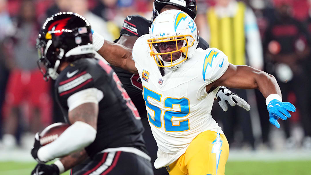 Oct 21, 2024; Glendale, Arizona, USA; Los Angeles Chargers linebacker Khalil Mack (52) pursues Arizona Cardinals running back James Conner (6) during the first half at State Farm Stadium. Mandatory Credit: Joe Camporeale-Imagn Images