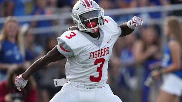 Fishers' Ryan Thembulembu (3) celebrates after catching a pass against Hamilton Southeastern last September.