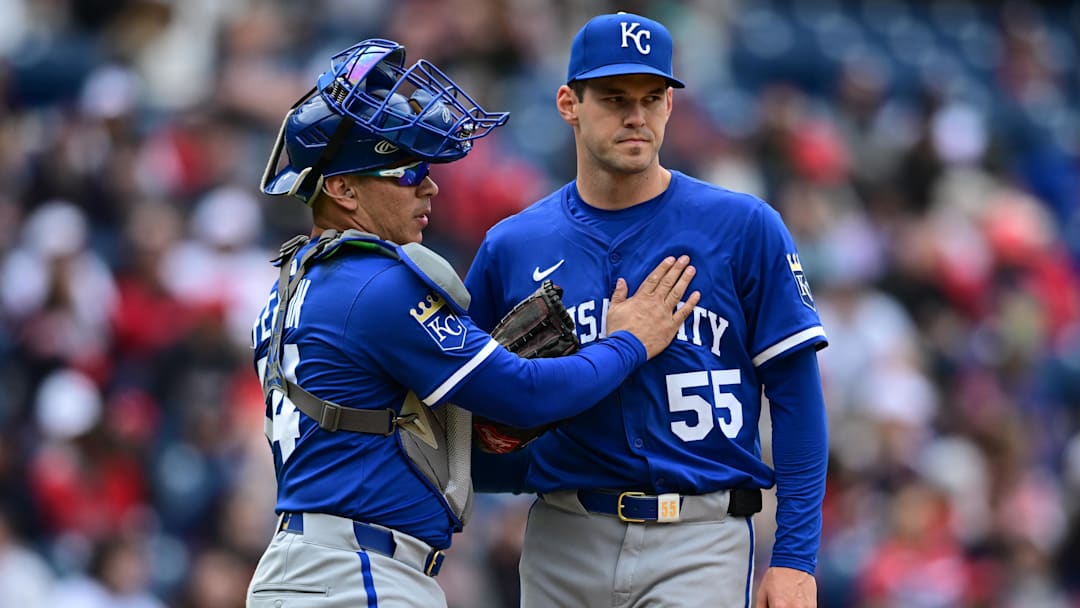Apr 13, 2025; Cleveland, Ohio, USA; Kansas City Royals starting pitcher Cole Ragans (55) is congratulated by catcher Freddy Fermin (34) before being removed from the game in the eighth inning against the Cleveland Guardians at Progressive Field. Mandatory Credit: David Dermer-Imagn Images