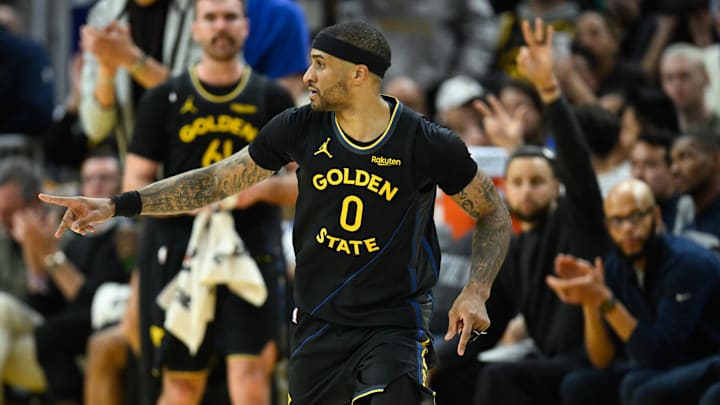 Feb 11, 2026; San Francisco, California, USA; Golden State Warriors guard Gary Payton II (0) celebrates a three-point basket against the San Antonio Spurs in the second quarter at Chase Center. Mandatory Credit: Eakin Howard-Imagn Images