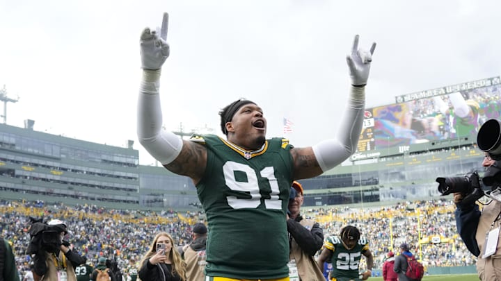 Green Bay Packers defensive lineman Preston Smith celebrates following the game against the Arizona Cardinals. Green Bay Packers defensive lineman Preston Smith celebrates following the game against the Arizona Cardinals.