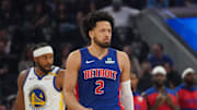 Mar 8, 2025; San Francisco, California, USA; Detroit Pistons guard Cade Cunningham (2) and Golden State Warriors guard Moses Moody (4) wait for play to resume in the first quarter at Chase Center. Mandatory Credit: David Gonzales-Imagn Images