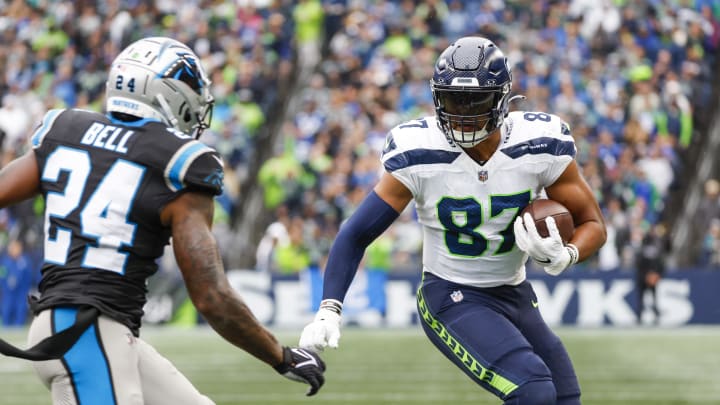 Sep 24, 2023; Seattle, Washington, USA; Seattle Seahawks tight end Noah Fant (87) runs for yards after the catch against the Carolina Panthers during the third quarter at Lumen Field. Mandatory Credit: Joe Nicholson-USA TODAY Sports
