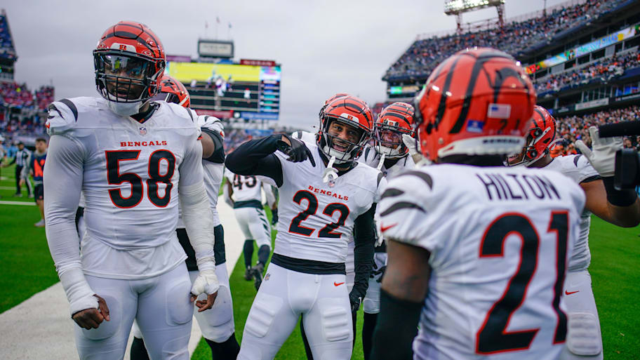Cincinnati Bengals safety Geno Stone (22) celebrates his touchdown off of an interception of a pass by Tennessee Titans quarterback Will Levis (8) during the third quarter at Nissan Stadium in Nashville, Tenn., Sunday, Dec. 15, 2024. | Andrew Nelles / The Tennessean / USA TODAY NETWORK via Imagn Images