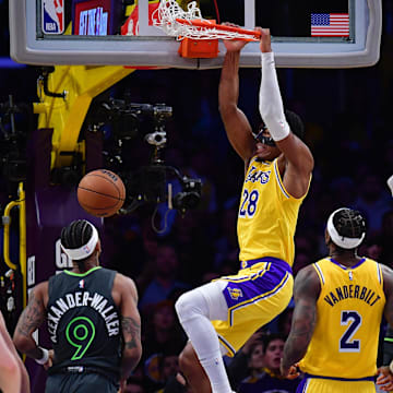 Apr 30, 2025; Los Angeles, California, USA: Los Angeles Lakers forward Rui Hachimura (28) dunks for the basket against the Minnesota Timberwolves during the second half in game five of first round for the 2025 NBA Playoffs at Crypto.com Arena. Mandatory Credit: Gary A. Vasquez-Imagn Images
