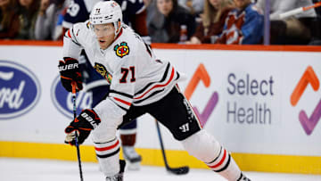 Chicago Blackhawks left wing Taylor Hall (71) controls the puck