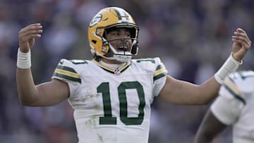 Nov 17, 2024; Chicago, Illinois, USA; Green Bay Packers quarterback Jordan Love (10) hurries his team downfield after throwing a 60-yard pass to wide receiver Christian Watson during the fourth quarter of their game Sunday, November 17, 2024 at Soldier Field in Chicago, Illinois. The Green Bay Packers beat the Chicago Bears 20-19. Mandatory Credit: Mark Hoffman/USA TODAY Network via Imagn Images 
