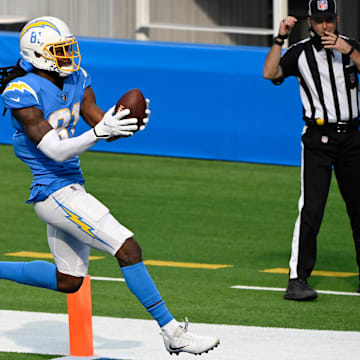 Nov 22, 2020; Inglewood, California, USA; Los Angeles Chargers wide receiver Mike Williams (81) scores on a touchdown pass against the New York Jets in the first quarter at SoFi Stadium. 