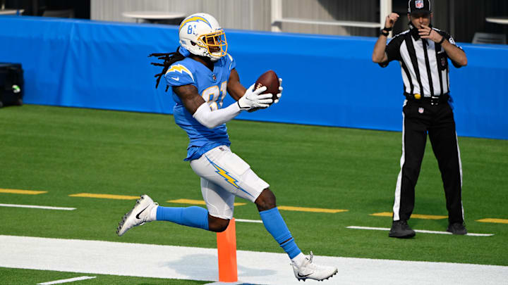 Nov 22, 2020; Inglewood, California, USA; Los Angeles Chargers wide receiver Mike Williams (81) scores on a touchdown pass against the New York Jets in the first quarter at SoFi Stadium. 