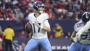 Dec 31, 2023; Houston, Texas, USA; Tennessee Titans quarterback Ryan Tannehill (17) looks for an open receiver during the fourth quarter against the Houston Texans at NRG Stadium.