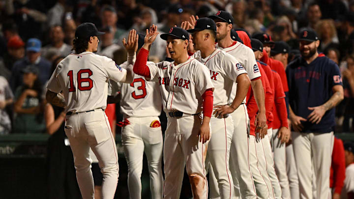 Sep 14, 2025; Boston, Massachusetts, USA; Boston Red Sox left fielder Jarren Duran (16) high-fives left fielder Masataka Yoshida (7) after a game against the New York Yankees at Fenway Park. Mandatory Credit: Brian Fluharty-Imagn Images