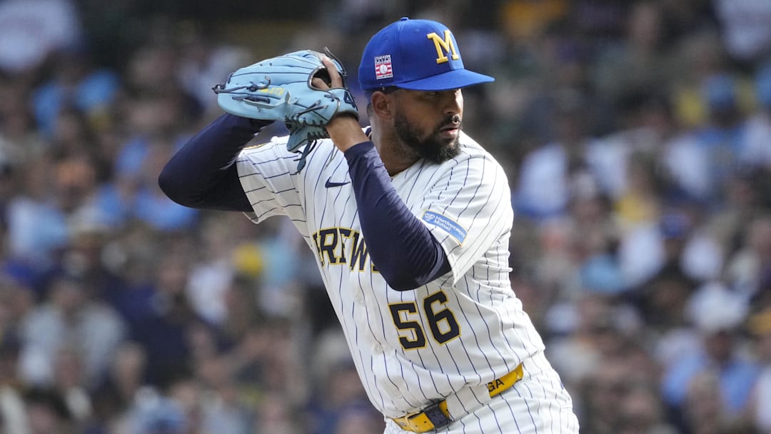 Jul 25, 2025; Milwaukee, Wisconsin, USA; Milwaukee Brewers pitcher Grant Anderson (56) prepares to deliver a pitch against the Miami Marlins in the eighth inning at American Family Field. Mandatory Credit: Michael McLoone-Imagn Images