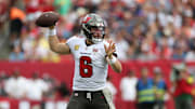 Nov 9, 2025; Tampa, Florida, USA; Tampa Bay Buccaneers quarterback Baker Mayfield (6) throws downfield during the second quarter against the New England Patriots at Raymond James Stadium. Mandatory Credit: Nathan Ray Seebeck-Imagn Images