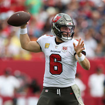 Nov 9, 2025; Tampa, Florida, USA; Tampa Bay Buccaneers quarterback Baker Mayfield (6) throws downfield during the second quarter against the New England Patriots at Raymond James Stadium. Mandatory Credit: Nathan Ray Seebeck-Imagn Images