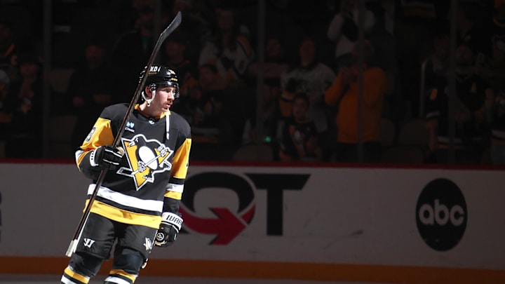 Mar 15, 2025; Pittsburgh, Pennsylvania, USA;  Pittsburgh Penguins center Connor Dewar (19) reacts after being named a star of the game against the New Jersey Devils at PPG Paints Arena. Mandatory Credit: Charles LeClaire-Imagn Images