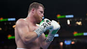 Sep 17, 2022; Las Vegas, Nevada, USA; Canelo Alvarez (red trunks) and Gennadiy Golovkin (white trunks) box during a super middleweight championship bout at T-Mobile Arena. Mandatory Credit: Joe Camporeale-Imagn Images