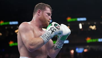 Sep 17, 2022; Las Vegas, Nevada, USA; Canelo Alvarez (red trunks) and Gennadiy Golovkin (white trunks) box during a super middleweight championship bout at T-Mobile Arena. Mandatory Credit: Joe Camporeale-Imagn Images