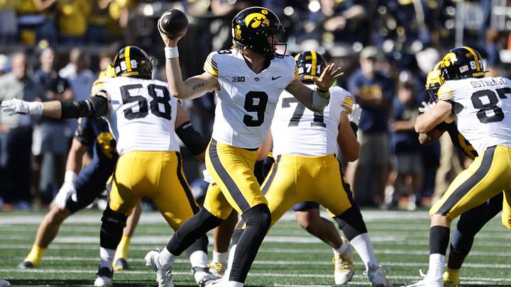 Sep 26, 2026; Ann Arbor, Michigan, USA;  Iowa Hawkeyes quarterback Hank Brown (9) passes against the Michigan Wolverines during the first half at Michigan Stadium.  Mandatory Credit: Rick Osentoski-Imagn Images