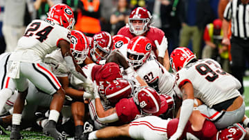 Dec 2, 2023; Atlanta, GA, USA; Alabama Crimson Tide running back Roydell Williams (5) dives for a touchdown against the Georgia Bulldogs in the fourth quarter of the SEC Championship at Mercedes-Benz Stadium. Mandatory Credit: John David Mercer-Imagn Images