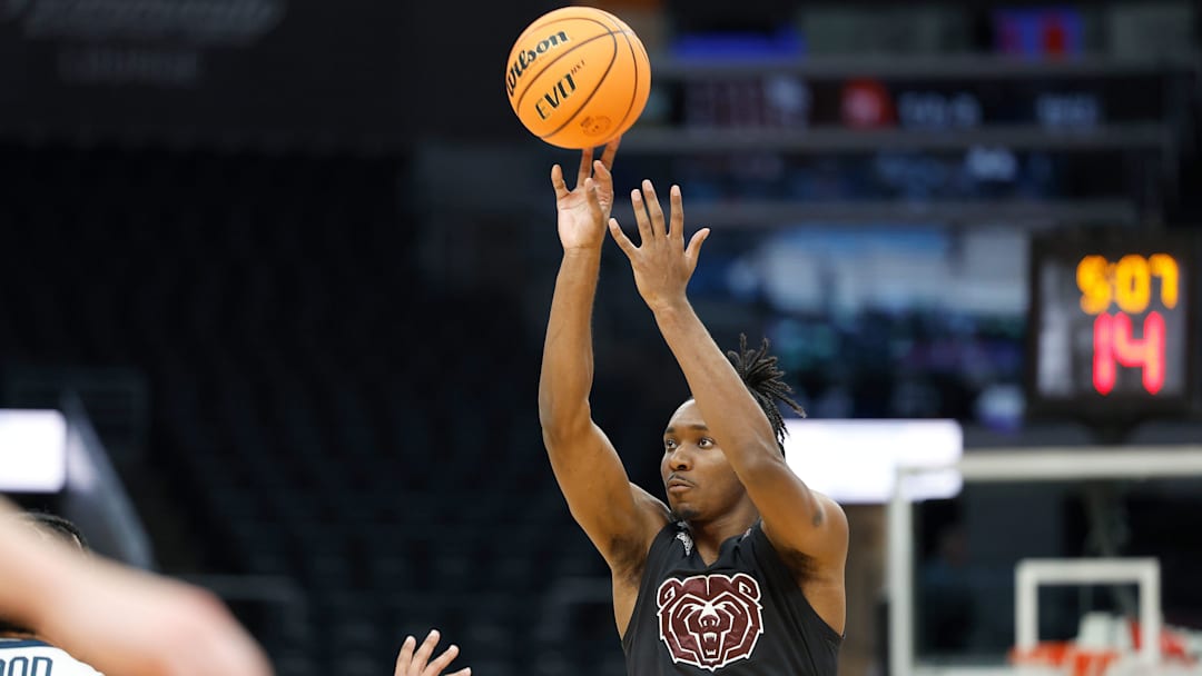 Missouri State junior Chance Moore (0) puts up a shot during a Missouri Valley Conference Tournament game between Missouri State and Murray State, Thursday, March 7, 2024, at Enterprise Center in St. Louis.