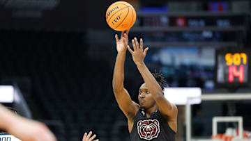 Missouri State junior Chance Moore (0) puts up a shot during a Missouri Valley Conference Tournament game between Missouri State and Murray State, Thursday, March 7, 2024, at Enterprise Center in St. Louis.
