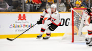 Feb 3, 2025; Nashville, Tennessee, USA; Ottawa Senators defenseman Jake Sanderson (85) skates behind the net against the Nashville Predators during the second period at Bridgestone Arena. Mandatory Credit: Steve Roberts-Imagn Images