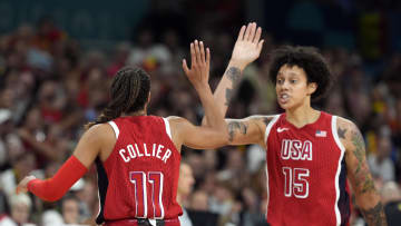 Aug 1, 2024; Villeneuve-d'Ascq, France; United States small forward Napheesa Collier (11) celebrates with centre Brittney Griner (15) after scoring against Belgium in the second half in a women’s group stage game during the Paris 2024 Olympic Summer Games at Stade Pierre-Mauroy. Mandatory Credit: John David Mercer-USA TODAY Sports