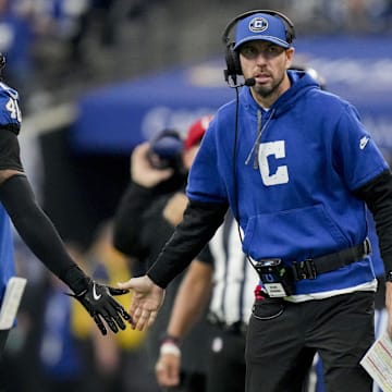 Nov 24, 2024; Indianapolis, Indiana, USA; Indianapolis Colts head coach Shane Steichen reaches for a high five from Indianapolis Colts cornerback Jaylon Jones (40) during a game against the Detroit Lions at Lucas Oil Stadium. Mandatory Credit: Christine Tannous/USA TODAY Network via Imagn Images