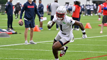 Jun 9, 2025; Foxborough, MA, USA; New England Patriots wide receiver Ja'Lynn Polk (1) runs through a drill during minicamp at Gillette Stadium. Mandatory Credit: Eric Canha-Imagn Images